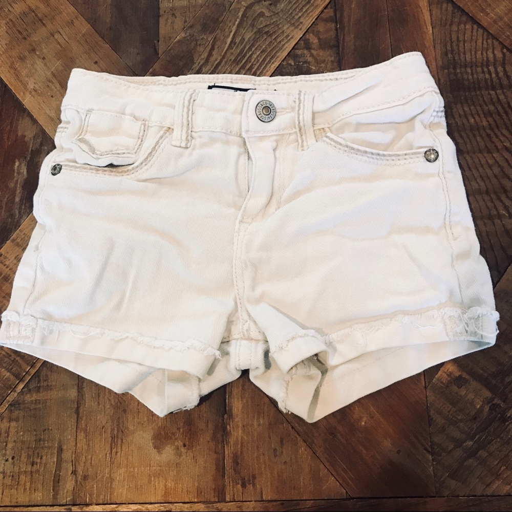 Levi’s white cuff cutoff shorts